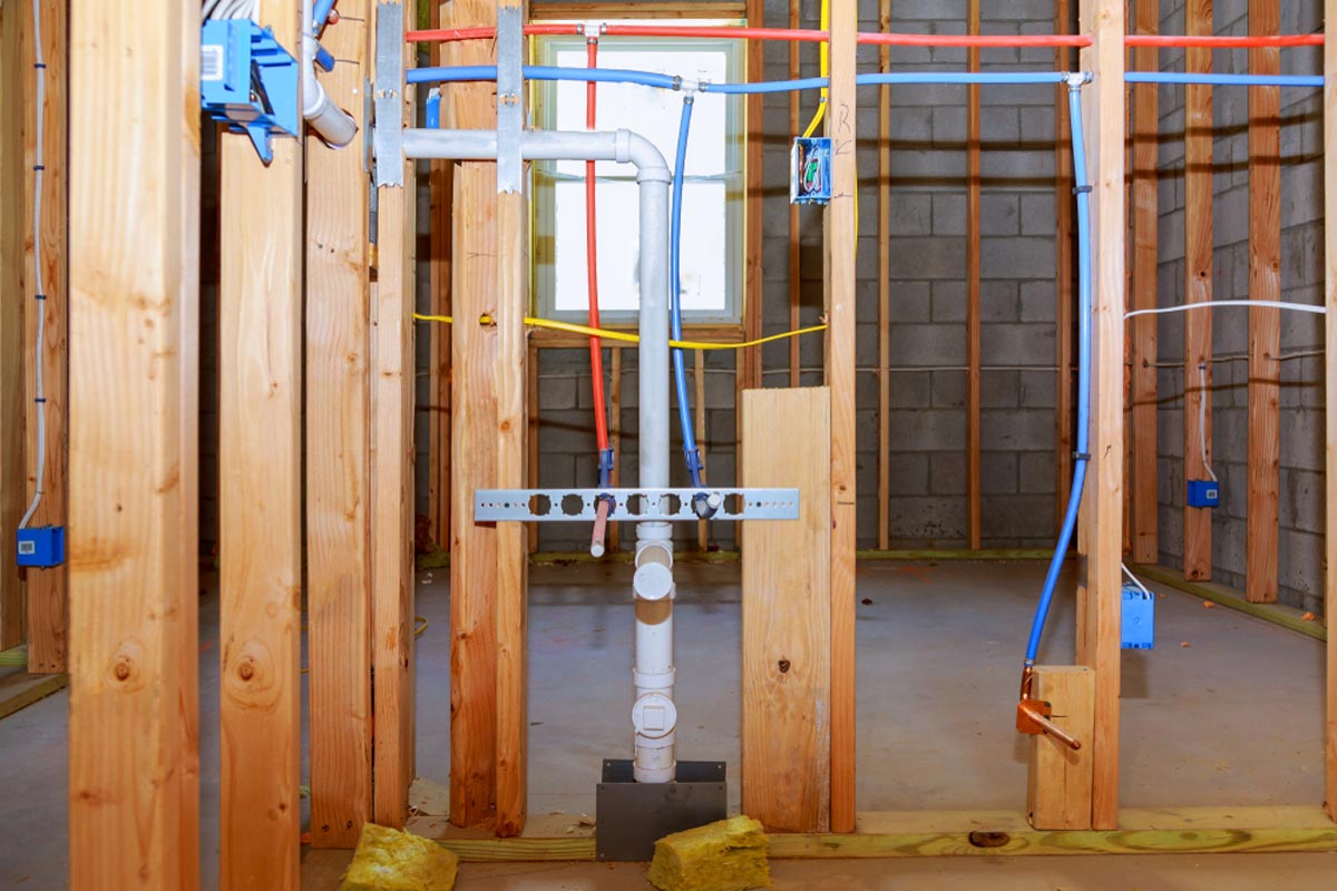 homeguide-new-home-construction-with-pex-plumbing-pipes-and-electrical-wiring.jpg